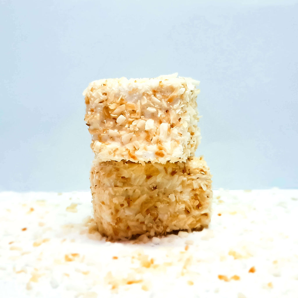 The softest, fluffiest, melt in the mouth handcrafted Vanilla flavoured Marshmallow coated in lightly toasted Coconut flakes